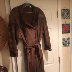 Womens Genuine Leather full length coat. Used. Size 12.